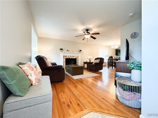 Chandelier, Dining room, Fireplace, Interior, Living room, Wood Texture Flooring