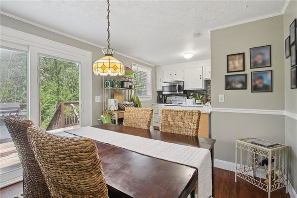 Dining room, Interior, Kitchen, Pendant Lights, Stainless Steel Appliances, Wood Texture Flooring