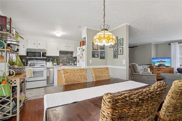 Dining room, Interior, Kitchen, Pendant Lights, Stainless Steel Appliances, Wood Texture Flooring
