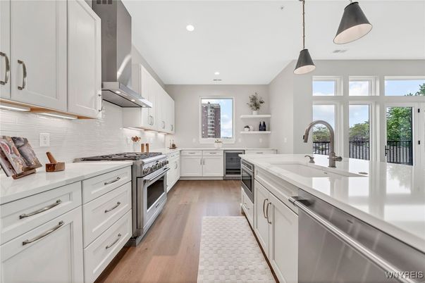 Interior, Kitchen, Pendant Lights, Recessed Lighting, Stainless Steel Appliances, Wood Texture Flooring