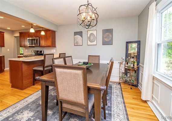 Chandelier, Dining room, Interior, Kitchen, Pendant Lights, Recessed Lighting, Stainless Steel Appliances, Wood Texture Flooring
