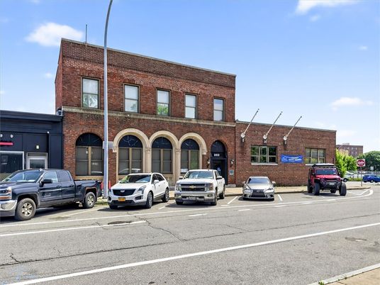 Exterior, Facade, Brick Facade, Condo Building