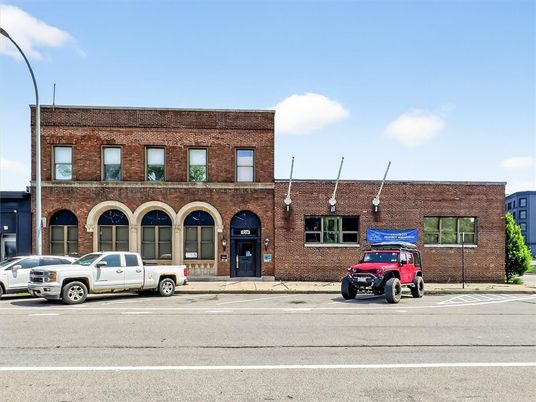 Exterior, Facade, Brick Facade, Condo Building