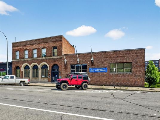 Exterior, Facade, Brick Facade, Condo Building
