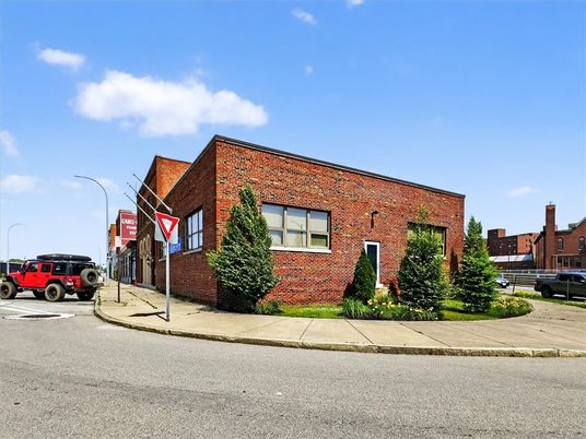 Exterior, Facade, Brick Facade, Condo Building