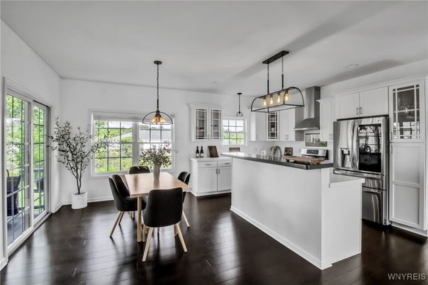 Dining room, Interior, Kitchen, Pendant Lights, Recessed Lighting, Stainless Steel Appliances, Wood Texture Flooring