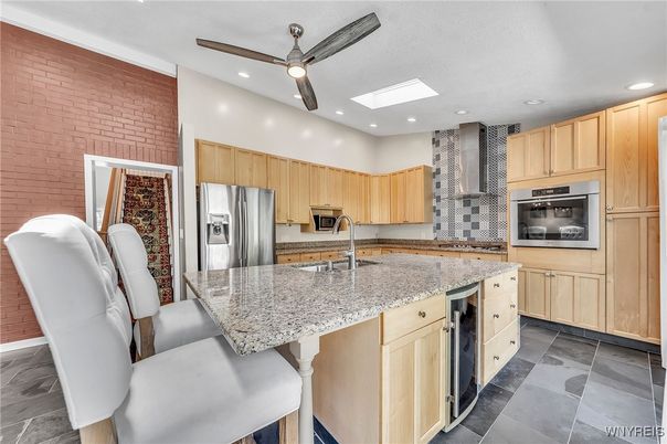 Interior, Kitchen, Recessed Lighting, Stainless Steel Appliances, Stone Walls