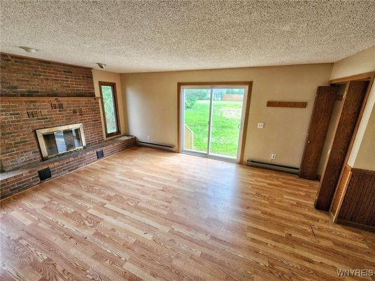 Empty room, Fireplace, Interior, Stone Walls, Wood Texture Flooring