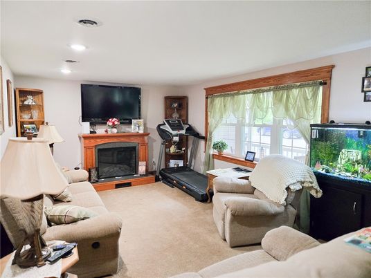 Fireplace, Fitness Equipment, Interior, Living room, Recessed Lighting
