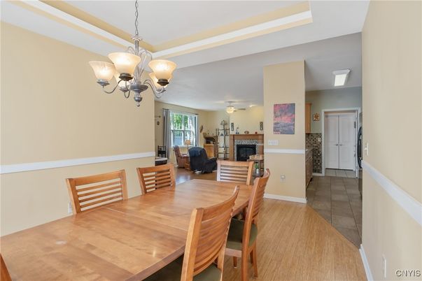 Chandelier, Dining room, Fireplace, Interior, Wood Texture Flooring