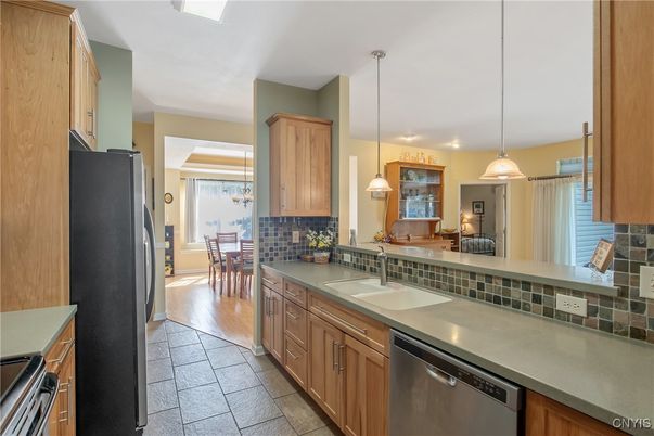Dining room, Interior, Kitchen, Pendant Lights, Stainless Steel Appliances, Wood Texture Flooring