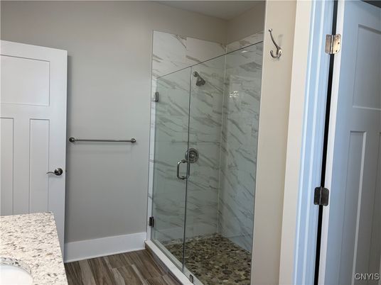 Bathroom, Glass Shower, Interior, Marble Walls, Wood Texture Flooring