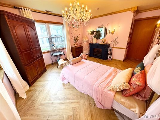 Bedroom, Chandelier, Fireplace, Interior, Wood Texture Flooring