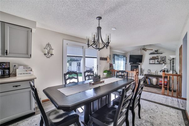 Chandelier, Dining room, Fireplace, Interior, Living room