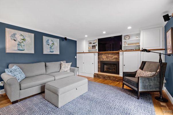 Fireplace, Interior, Living room, Recessed Lighting, Wood Texture Flooring