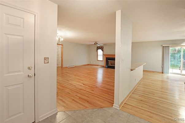 Chandelier, Empty room, Fireplace, Interior, Wood Texture Flooring