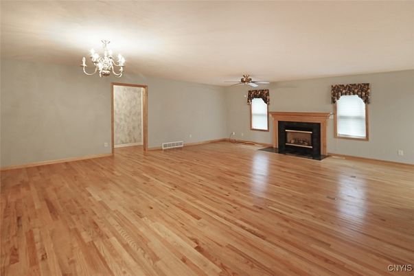 Chandelier, Empty room, Fireplace, Interior, Wood Texture Flooring