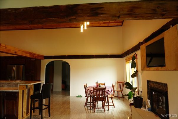 Dining room, Fireplace, Interior, Wooden Beams, Wood Texture Flooring
