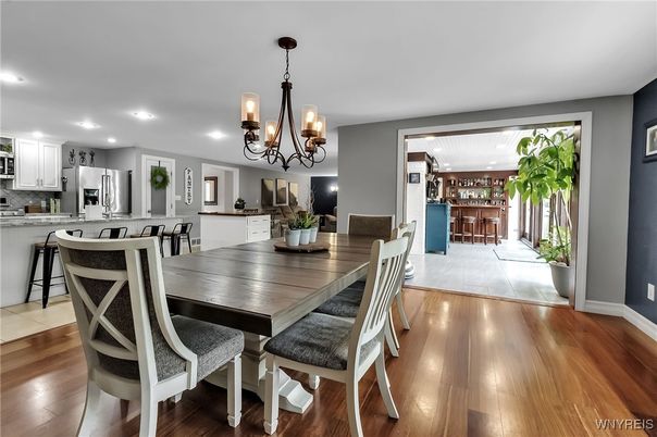 Chandelier, Dining room, Interior, Kitchen, Recessed Lighting, Stainless Steel Appliances, Wood Texture Flooring
