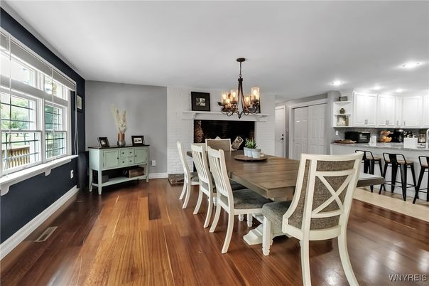Chandelier, Dining room, Fireplace, Interior, Kitchen, Recessed Lighting, Wood Texture Flooring