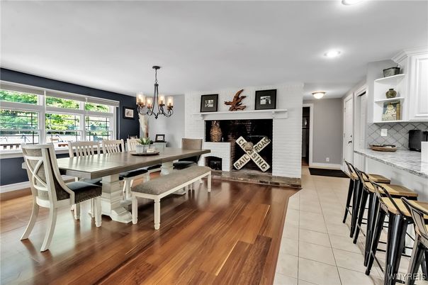 Chandelier, Dining room, Fireplace, Interior, Recessed Lighting, Wood Texture Flooring