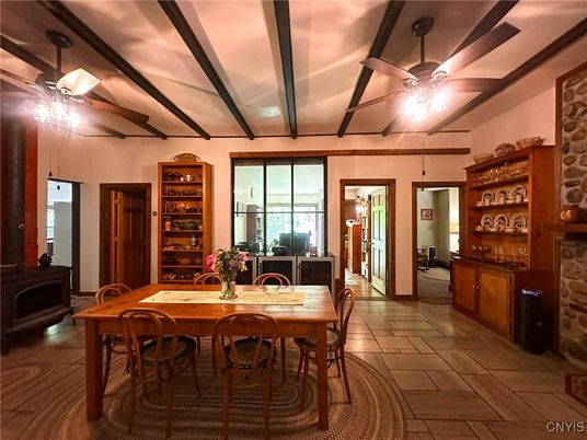 Chandelier, Dining room, Interior, Kitchen, Stainless Steel Appliances, Wood Texture Flooring