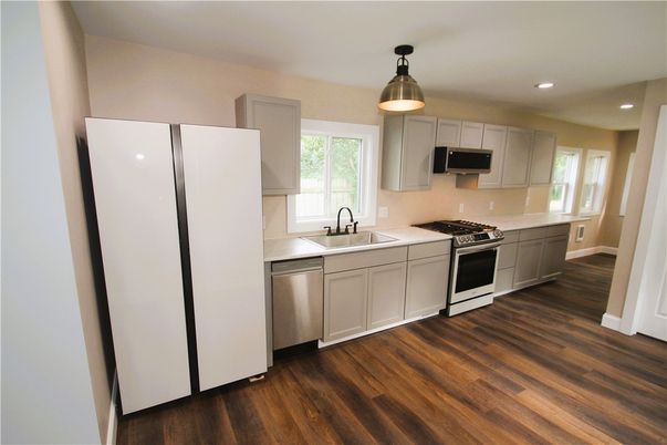 Interior, Kitchen, Recessed Lighting, Stainless Steel Appliances, Wood Texture Flooring