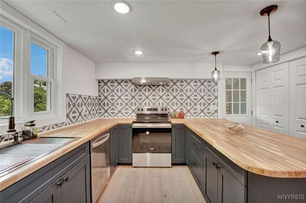 Interior, Kitchen, Pendant Lights, Recessed Lighting, Stainless Steel Appliances, Wood Texture Flooring
