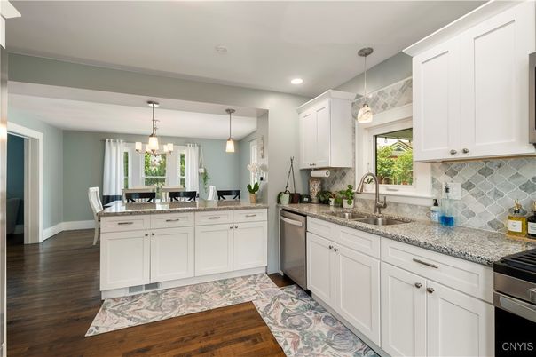 Dining room, Interior, Kitchen, Pendant Lights, Recessed Lighting, Stainless Steel Appliances, Wood Texture Flooring