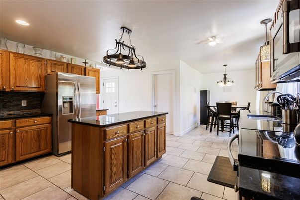 Chandelier, Dining room, Interior, Kitchen, Recessed Lighting, Stainless Steel Appliances