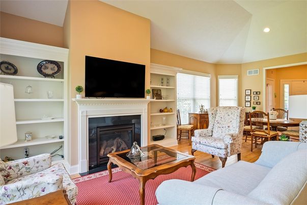 Dining room, Fireplace, Interior, Living room, Recessed Lighting, Wood Texture Flooring