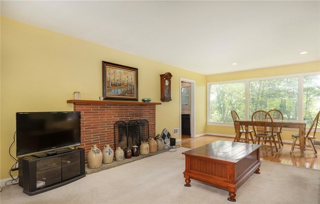 Dining room, Fireplace, Interior, Recessed Lighting, Wood Texture Flooring