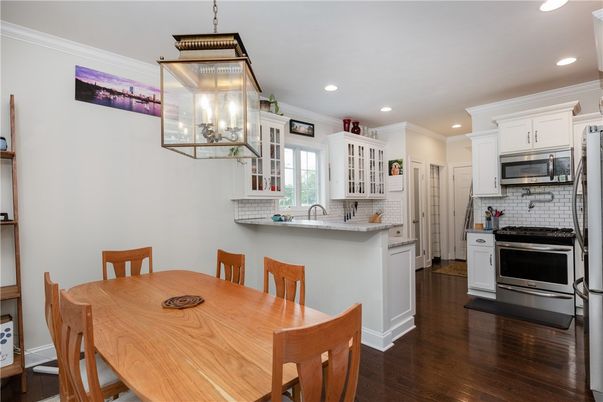 Dining room, Interior, Kitchen, Recessed Lighting, Stainless Steel Appliances, Wood Texture Flooring