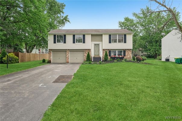 Attached, Exterior, Facade, Raised Ranch