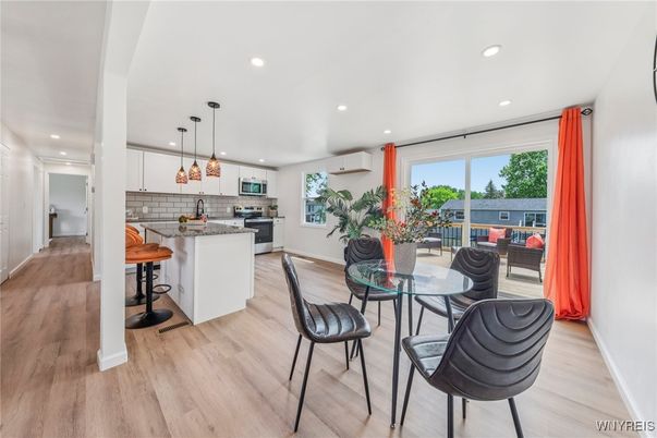 Dining room, Interior, Kitchen, Pendant Lights, Recessed Lighting, Stainless Steel Appliances, Wood Texture Flooring