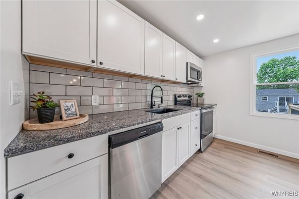 Interior, Kitchen, Recessed Lighting, Stainless Steel Appliances, Wood Texture Flooring