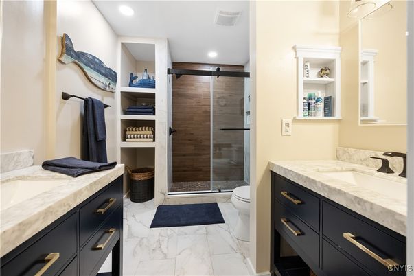 Bathroom, Dual Sink Vanities, Glass Shower, Interior, Marble, Recessed Lighting