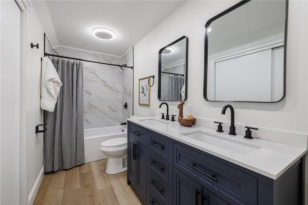 Bathroom, Dual Sink Vanities, Interior, Marble Walls, Wood Texture Flooring