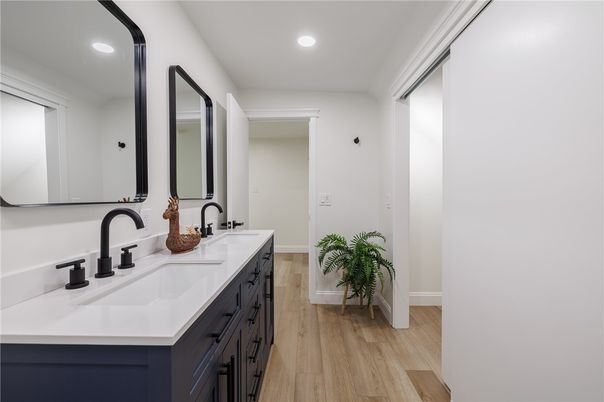 Bathroom, Dual Sink Vanities, Interior, Recessed Lighting, Wood Texture Flooring