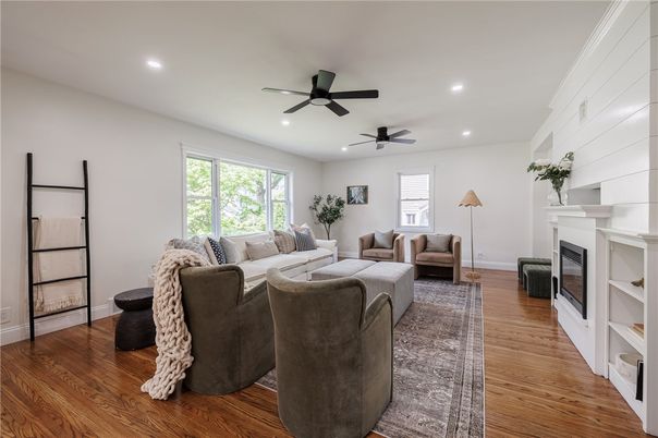Fireplace, Interior, Living room, Recessed Lighting, Wood Texture Flooring