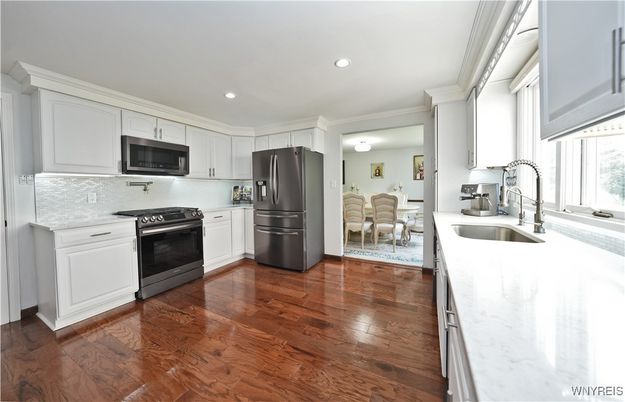 Dining room, Interior, Kitchen, Recessed Lighting, Stainless Steel Appliances, Wood Texture Flooring