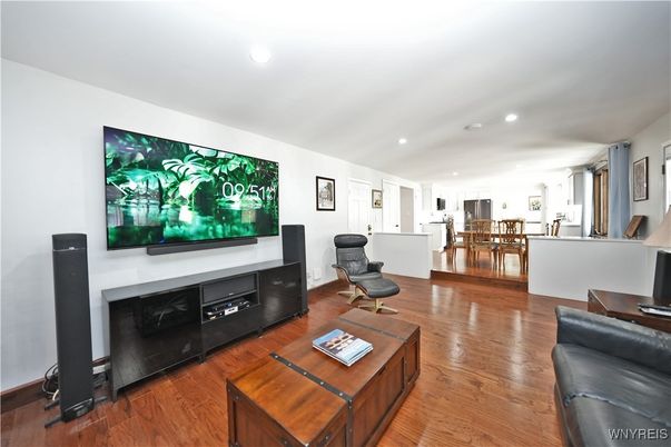 Dining room, Fireplace, Interior, Living room, Recessed Lighting, Wood Texture Flooring
