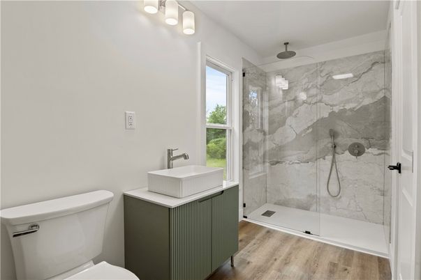Bathroom, Glass Shower, Interior, Marble Walls, Wood Texture Flooring