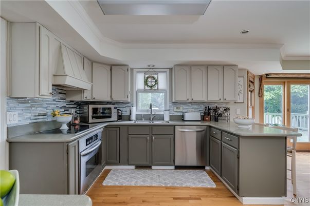 Interior, Kitchen, Recessed Lighting, Stainless Steel Appliances, Wood Texture Flooring