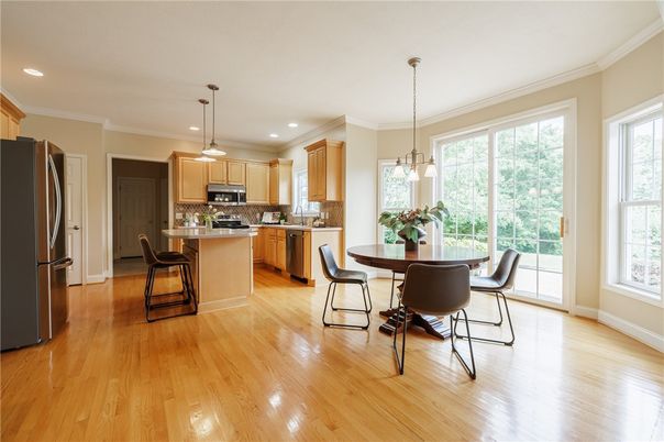 Dining room, Interior, Kitchen, Pendant Lights, Recessed Lighting, Stainless Steel Appliances, Wood Texture Flooring