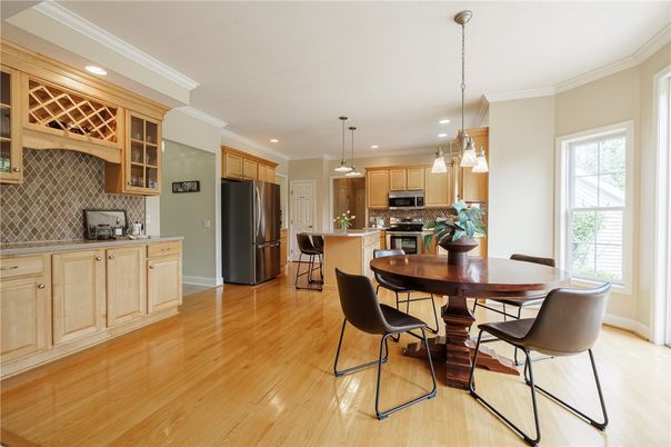 Dining room, Interior, Kitchen, Pendant Lights, Recessed Lighting, Stainless Steel Appliances, Wood Texture Flooring