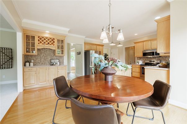 Dining room, Interior, Kitchen, Pendant Lights, Recessed Lighting, Stainless Steel Appliances, Wood Texture Flooring