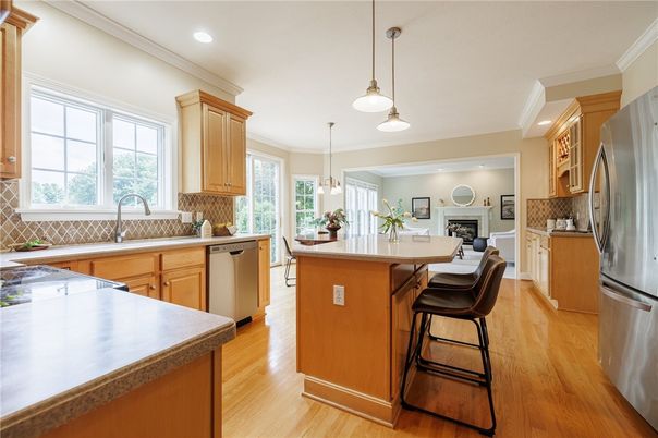 Fireplace, Interior, Kitchen, Pendant Lights, Recessed Lighting, Stainless Steel Appliances, Wood Texture Flooring