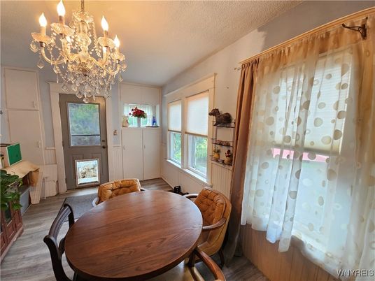 Chandelier, Dining room, Interior, Wood Texture Flooring
