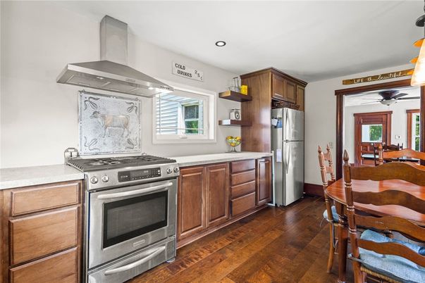 Dining room, Interior, Kitchen, Recessed Lighting, Stainless Steel Appliances, Wood Texture Flooring